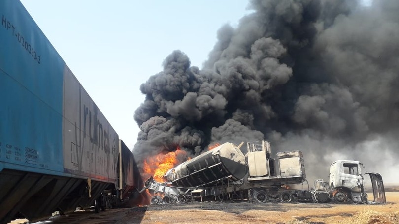 Caminh�o-tanque se choca com trem e provoca explos�o em ferrovia de MT